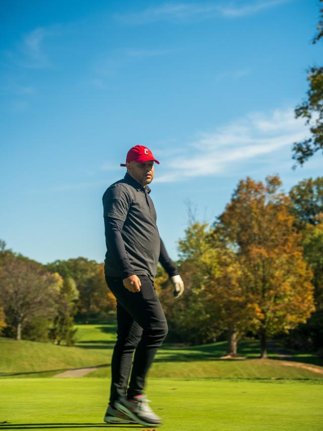 Aaron Davis watching his drive from the tee