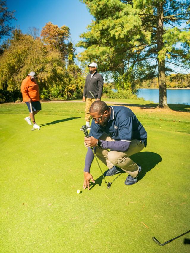 Jason Jones putting on the green